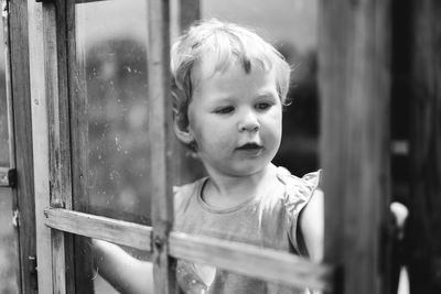 Portrait of cute girl standing outdoors