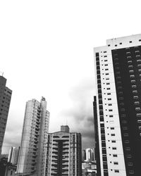 Low angle view of buildings against sky in city