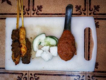 High angle view of food on table against wall