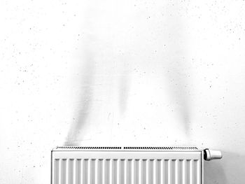 Radiator against white wall