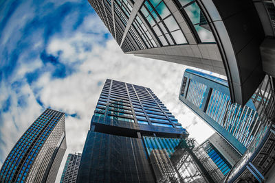 Low angle view of modern buildings against sky