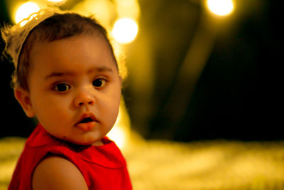 Portrait of cute girl looking away