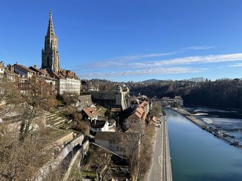 Panoramic view of münster cathedral in bern against sky