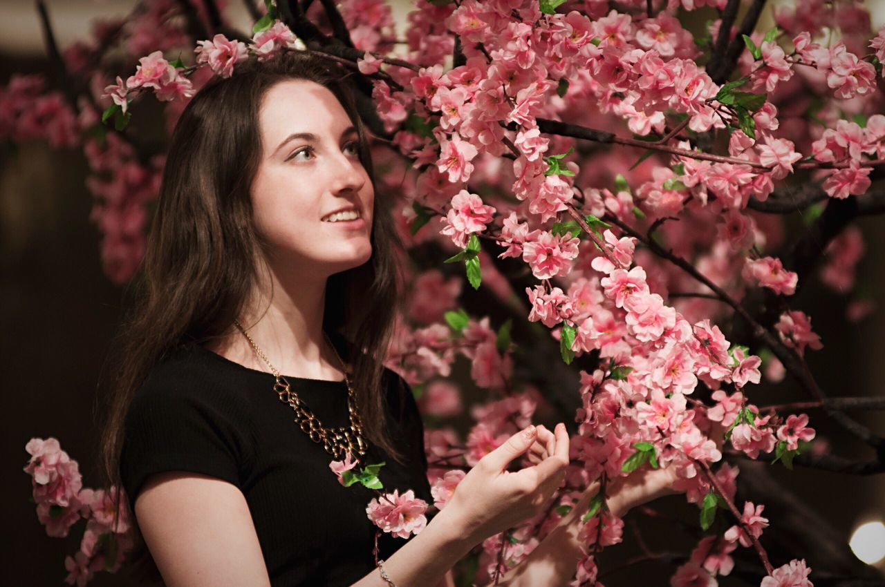 flower, springtime, nature, pink color, adults only, only women, one woman only, beauty, beauty in nature, freshness, summer, portrait, adult, young adult, beautiful woman, one person, blossom, arts culture and entertainment, outdoors, people, one young woman only, human body part, rhododendron, day