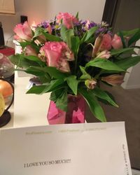 Close-up of pink flowers on table