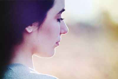 Nostalgic woman outdoors