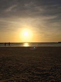 Scenic view of sea at sunset