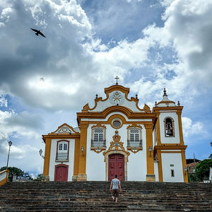 Low angle view of historic building against cloudy sky