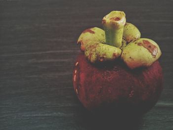 High angle view of apple on table