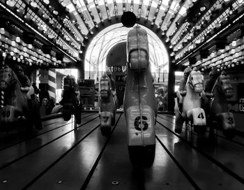 Illuminated amusement park at night