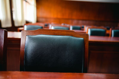 Close-up of empty seats on table