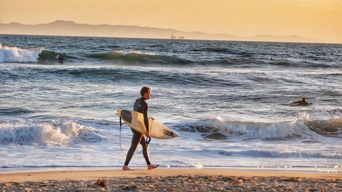 Rear view of man on beach