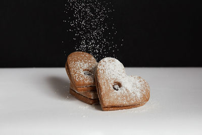Close-up of cookies against black background