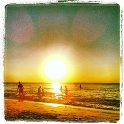 Scenic view of sea at sunset