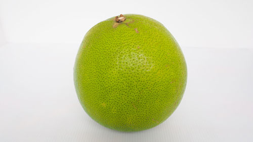 Close-up of apple against white background