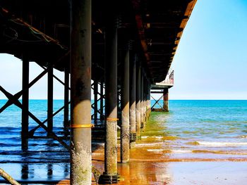 Pier on sea against sky