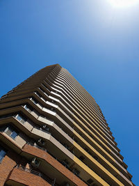 Low angle view of modern building against clear sky