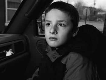 Portrait of boy in car