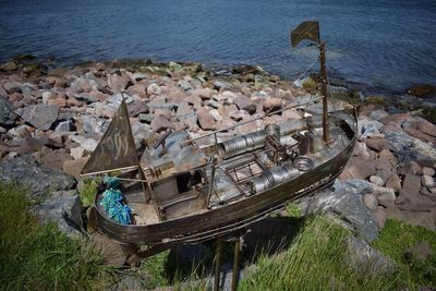 High angle view of rocks by sea