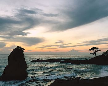 Scenic view of sea at sunset