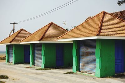 Three closed huts at the beach