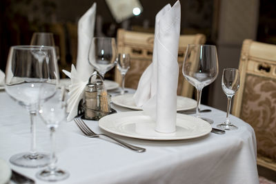 Drinking glasses on table in restaurant