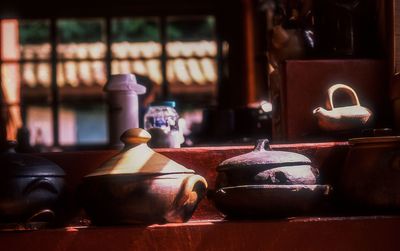 Close-up of old objects on table