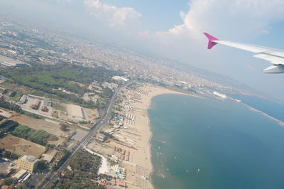 Aerial view of cityscape against sky