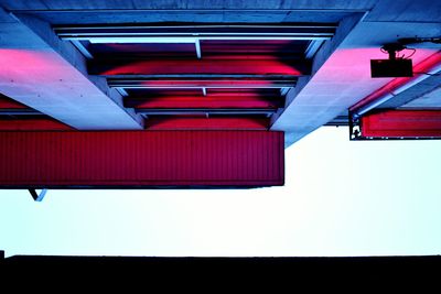 Low angle view of multi colored flags hanging on building