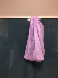 Close-up of clothes hanging at home