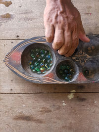 High angle view of man preparing food on table