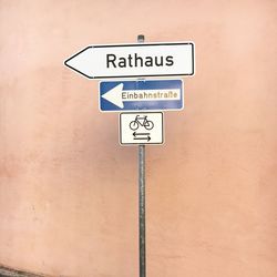 Various road sign against wall