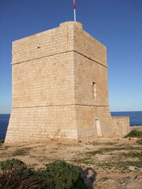 View of fort against blue sky