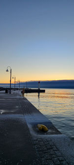 Lake  against clear sky at sunset