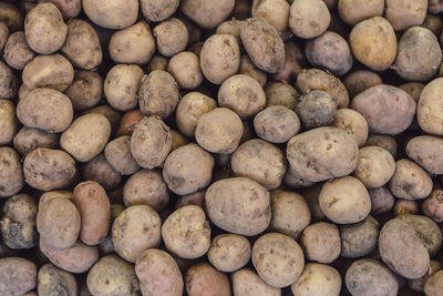 Directly above shot of potatoes for sale at market