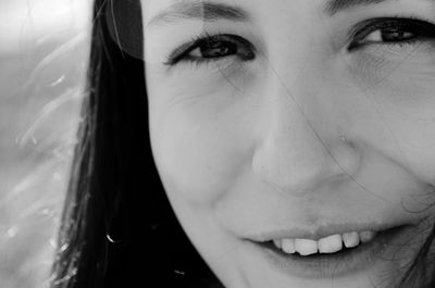 Close-up portrait of smiling woman