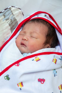 High angle portrait of cute baby sleeping