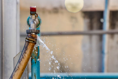 Close-up of water pipe from faucet