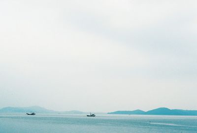 Boat sailing in sea