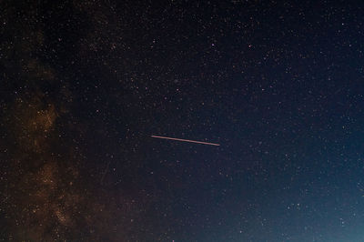 Low angle view of vapor trails in sky
