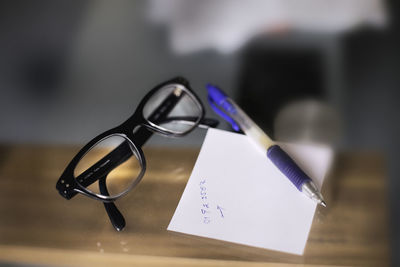 Close-up of eyeglasses on table