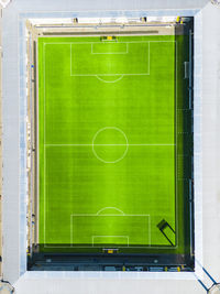 Aerial view of stadium with football pitch