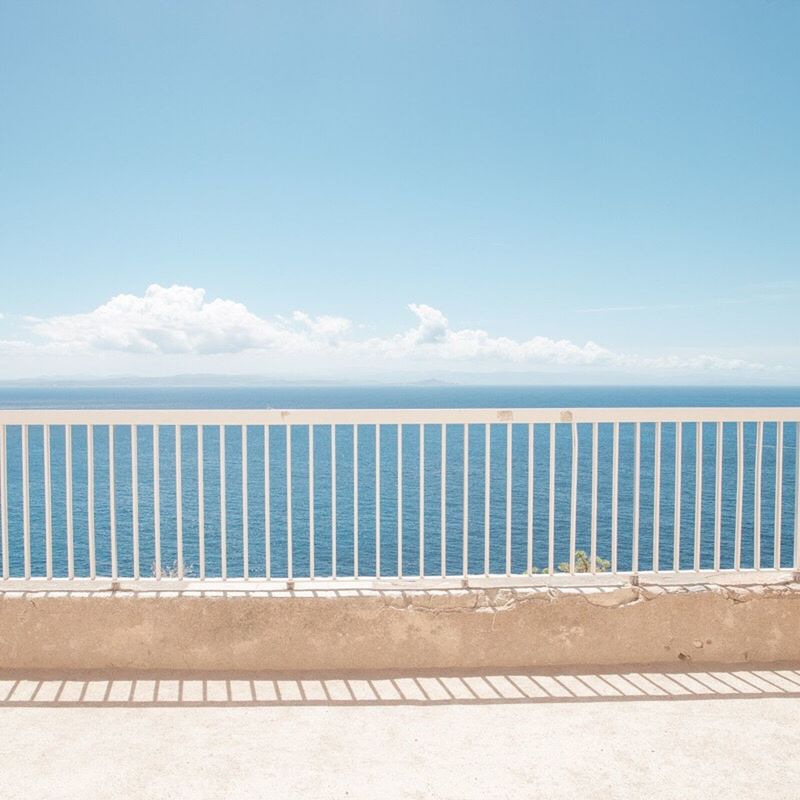 sea, beach, sand, blue, horizon over water, tranquility, water, tranquil scene, sky, nature, outdoors, day, beauty in nature, no people, scenics, wheelchair access