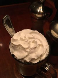 Close-up of ice cream in jar on table