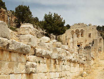 Low angle view of old ruins against sky