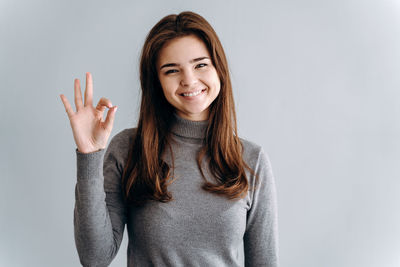 Portrait of a smiling young woman