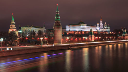 Illuminated buildings in city at night