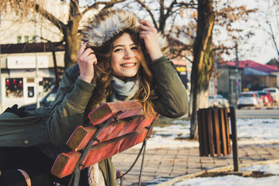 Portrait of young woman in winter