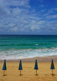 Scenic view of beach against sky