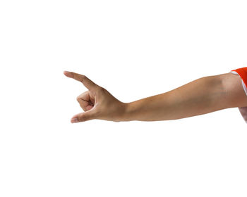 Close-up of human hand over white background